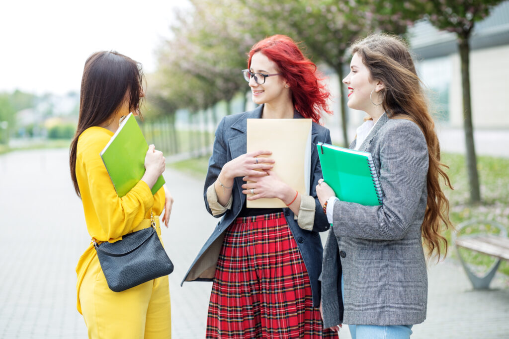 https://www.dreamstime.com/three-students-talking-their-studies-campus-education-concept-friendship-group-people-image147648226