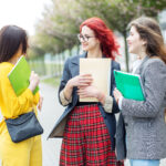 https://www.dreamstime.com/three-students-talking-their-studies-campus-education-concept-friendship-group-people-image147648226